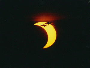 GIF Planes in front of Eclipsed Sun